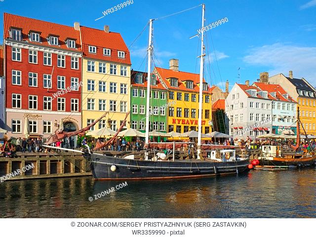 COPENHAGEN, DENMARK - AUGUST 22, 2014: The Nyhavn canal. Nyhavn is waterfront, canal and entertainment district in Copenhagen