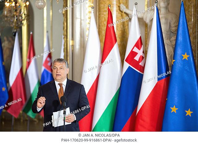 Hungarian Prime Minister Viktor Orban receives the presidency of the Visegrad Group to Hungary, during a ceremony at the Royal Castle in Warsaw, Poland, Monday