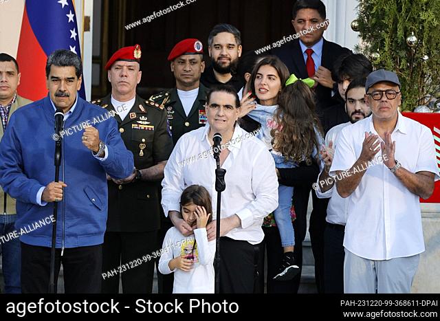 20 December 2023, Venezuela, Caracas: Nicolás Maduro (l), President of Venezuela, greets Alex Saab (M), Colombian businessman