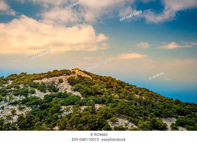 Beautiful landscape with a little house in rocky mountains on the western part of Mallorca island, Spain. Tramuntana mountains with forest