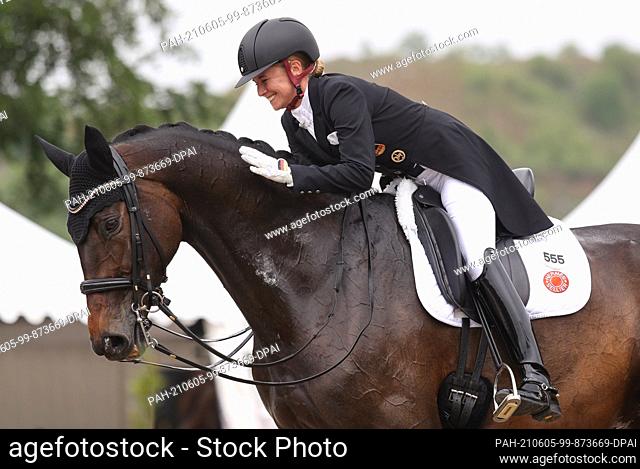 05 June 2021, North Rhine-Westphalia, Balve: Equestrian sport: German Championships, Dressage. Dressage rider Jessica von Bredow-Werndl rides and wins on Dalera...