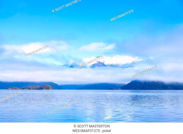 Scenic view of Lake Manapouri against sky at Te Anau, South Island, New Zealand