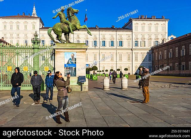 Tourists next to the Royal Palace of Turin is a historic palace of the House of Savoy. Turin, Piedmont, Italy, Europe