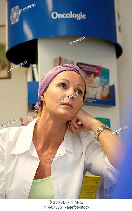 Patient sitting in the waiting room of Oncology department at hospital