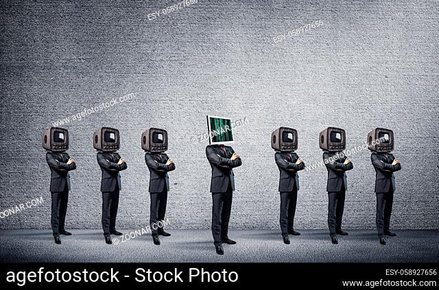 Businessmen in suits with old TV instead of their heads keeping arms crossed while standing in a row and one at the head with monitor in empty room