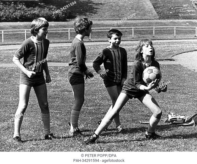 Matthias Brandt (r), son of Federal Chancellor Willy Brandt, on 27 May 1973, together with his teammates of SSV Plittersdorf at a warm-up prior to a soccer...