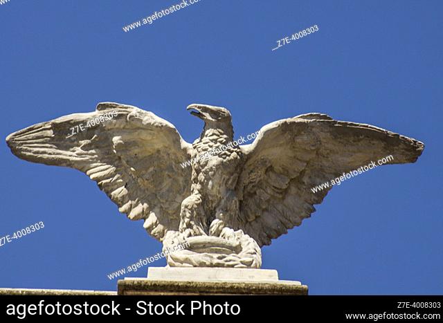 Eagle sculpture above façade of Bellini Theater (Teatro Massimo Bellini)). Telephoto. Metropolitan City of Catania, Sicily, Italy