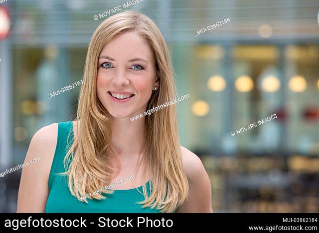 Portrait of a young, smiling, blonde woman