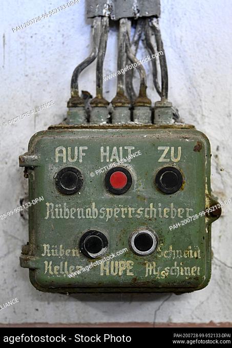 23 July 2020, Thuringia, Oldisleben: ""Beet shut-off valve"" is written on a switchboard in the Oldisleben sugar factory