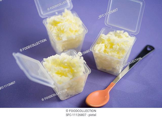 Grated Ginger in Small Plastic Containers with a Baby Spoon