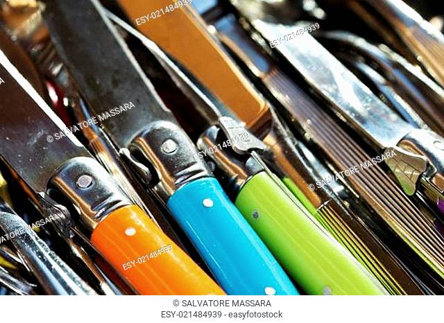 motives repetitives by colored handles of knives