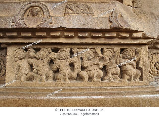 Figures of the shiva ganas (servants of the lord Shiva) carved on the plinth, Durga temple, Aihole, Bagalkot, Karnataka, India