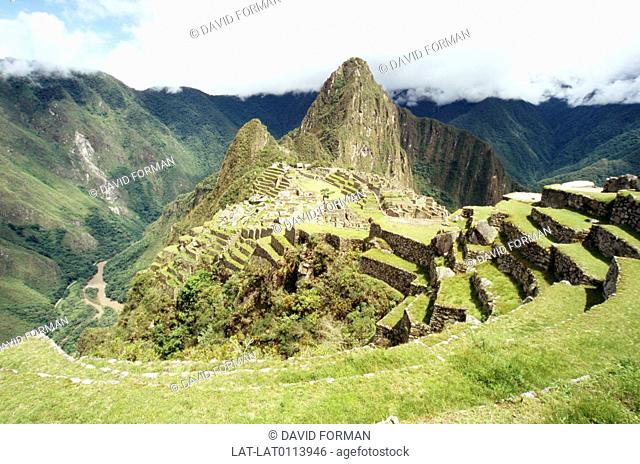 An Inca site, located on a mountain ridge at 7, 970 ft, is known as the Lost City of the Incas with terraced stone walls and cliffs