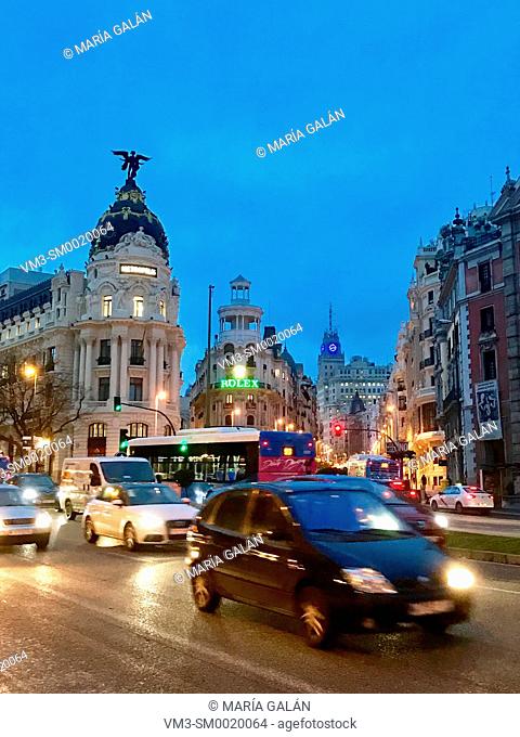 Traffic in Alcala street, night view. Madrid, Spain