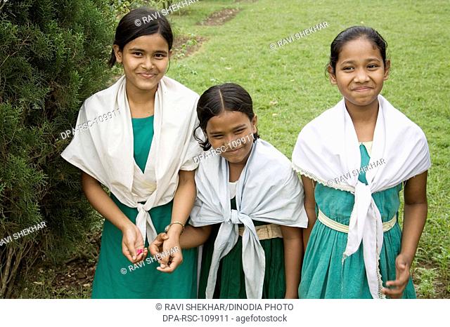 Three Muslim girls in green color school uniform ; Lalbag fort ; Dhaka ; Bangladesh