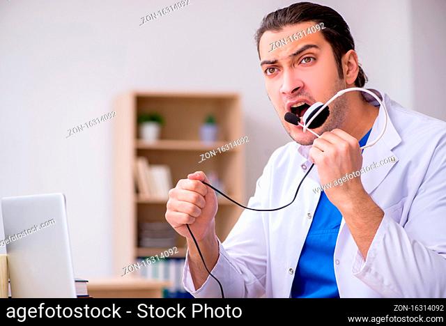 Male doctor in telemedicine concept