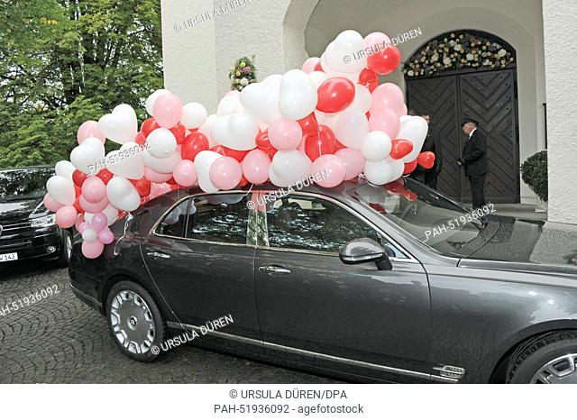 A decorated car at the wedding of Princess Maria Theresia of Thurn and Taxis and Hugo Wilson in Tutzing, Germany, 13 September 2014