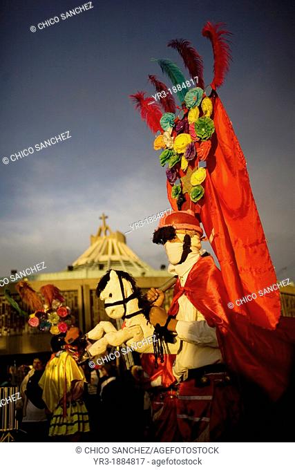A pilgrim from Tomatlan, Veracruz state, dressed as Saint James apostle performs the Baile de los Santiagos or Saint James's Dance riding a toy horse outside of...