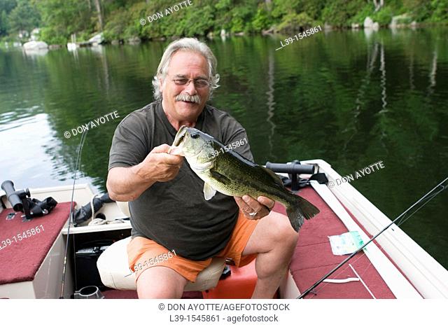 man with a 5LB bass that was caught on Laurel Lake, in Irving, MA, USA