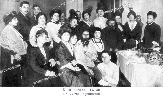 Grigori Rasputin and a group of women, 1917. Rasputin was a monk and close confidant of the Russian Csarina