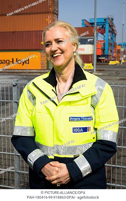 16 April 2018, Germany, Hamburg: Angela Titzrath, CEO of Hamburger Hafen und Logistik AG (HHLA), stands next to the Containerterminal Altenwerder (CTA) during a...