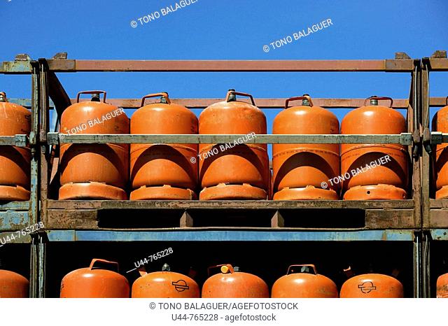 Stacked Butano Gas orange containers