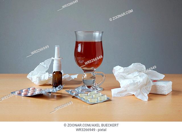 common cold or flu remedies. nasal spray, pills, tea tissues