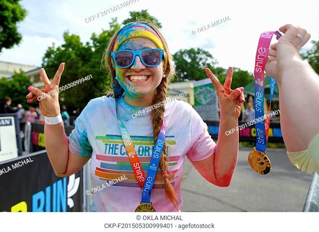 People celebrate healthiness, peace, individuality and and giving back to the community at unique colorful 5 km race called The Color Run in Prague