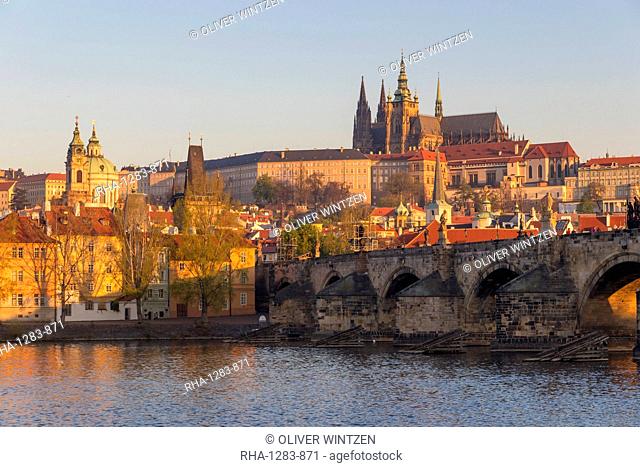 View from the banks of Vltava River to Charles Bridge, Prague Castle and St. Vitus Cathedral, UNESCO World Heritage Site, Prague, Bohemia, Czech Republic