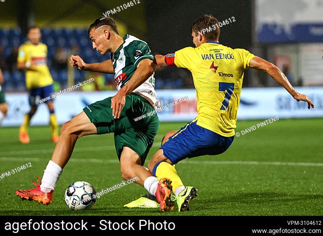 Lommel's Augustin Anello and Westerlo's Lukas Van Eeno fight for the ball during a soccer match between KVC Westerlo and Lommel SK