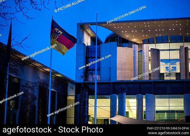 dpatop - 10 December 2023, Berlin: The Chancellery is illuminated at the blue hour. Following the Federal Constitutional Court's budget ruling