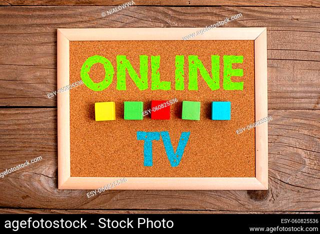 Handwriting text Online Tv, Business showcase a television production broadcast in realtime as events happen Stack of Sample Cube Rectangular Boxes On Surface...