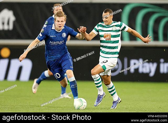 Gent's Jens Petter Hauge and Shamrock's Graham Burke fight for the ball during a soccer match between Belgian KAA Gent and Irish Shamrock Rovers F.C