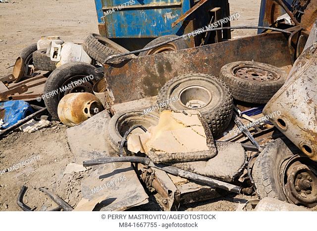Pile of discarded industrial items at a scrap metal recycling centre, Quebec, Canada