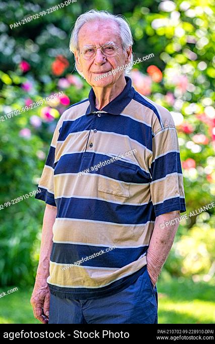 PRODUCTION - 28 June 2021, Bavaria, Pocking: Wilfried Klaus, actor, stands in his garden. The actor has appeared in a number of German television series