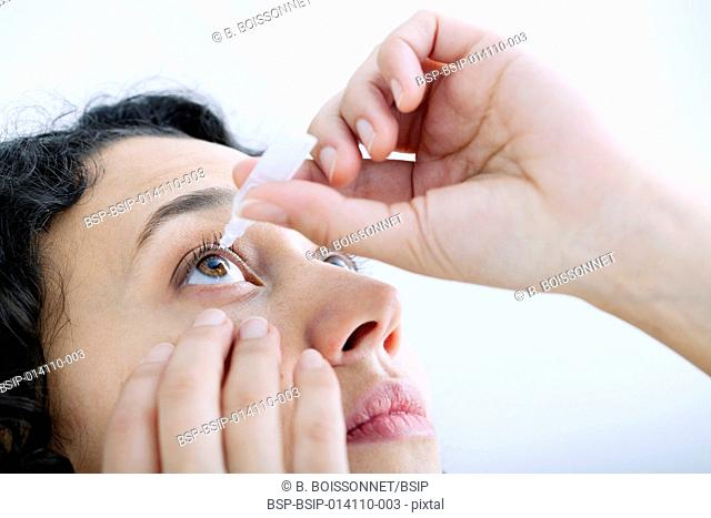 Woman using eyewash
