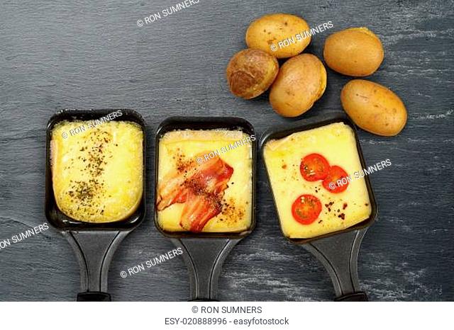 Raclette trays and potatoes