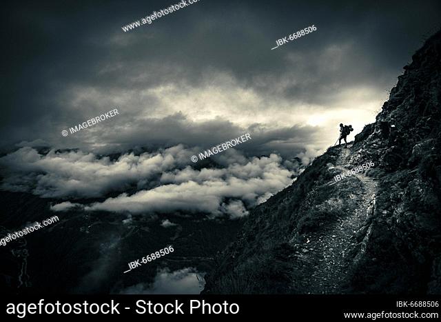Climber on mountain trail in bad weather, Sölden, Ötztal, Tyrol, Austria, Europe