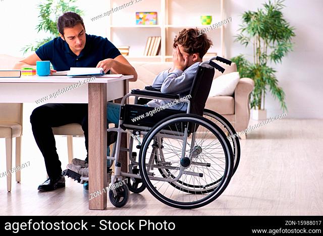 Father and disabled son in the education concept