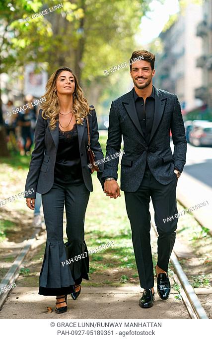 Eleonora Brunacci Di Vaio and Mariano Di Vaio walking outside of the Dolce & Gabbana runway show during Milan Fashion Week - Sept 24