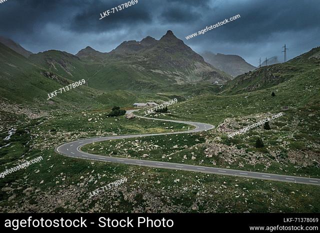 Julier Pass in summer with a dramatic cloudy sky in the Swiss Alps in GraubÃ¼nden from above
