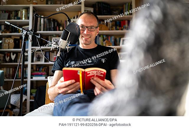 29 October 2019, Lower Saxony, Kakenstorf: Toby Baier, ""falling asleep"" podcaster, sits in his study and is in the process of making a new contribution