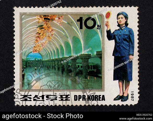 DPR Korea - CIRCA 1987: Post stamps printed in DPR Korea in 1987 and dedicated electric locomotives trains and conductor