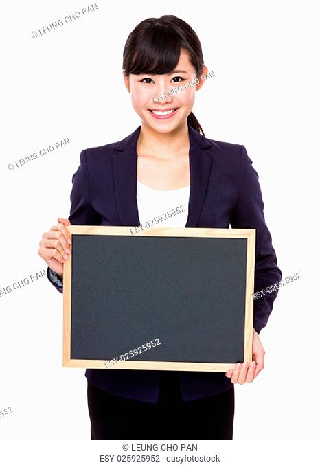 Asian young businesswoman show with empty chalkboard