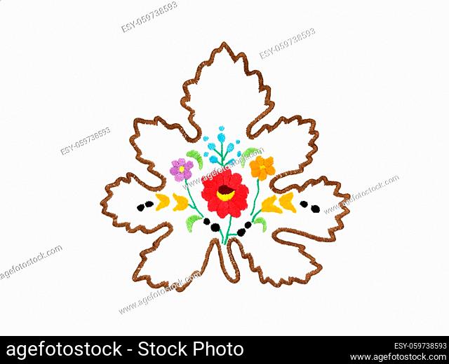 Embroidery with floral motives isolated on white background