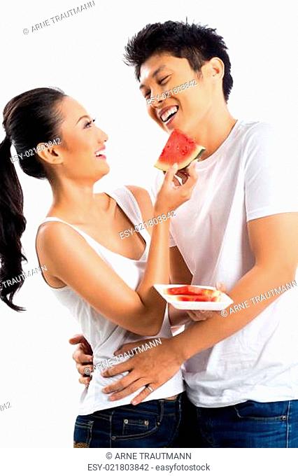 Asian couple eating and living healthy
