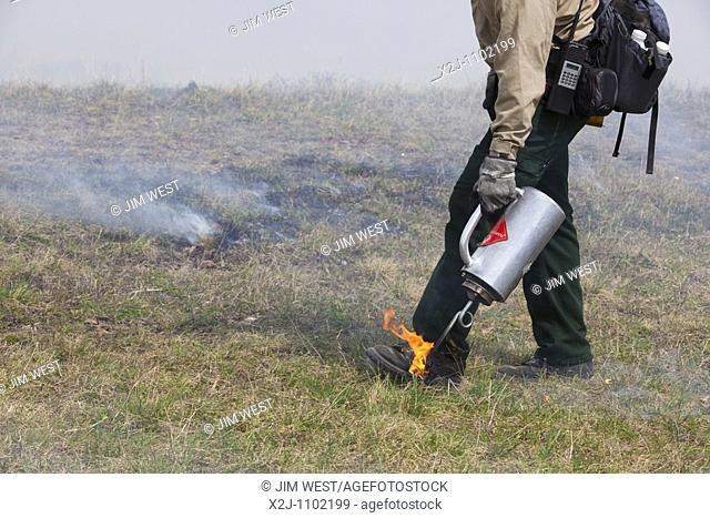 Shenandoah National Park, Virginia - Workers wearing fire resistant clothing intentionally burn Big Meadows  The National Park Service burns part of the meadow...