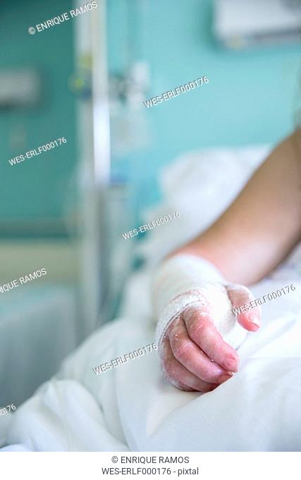 Woman in the hospital, operated hand
