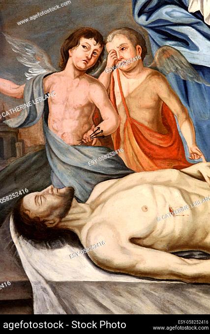 Baroque painting of the altarpiece: Our Lady of the Seven Sorrows. Details. Details: Jesus Christ in the tomb and two angels weeping