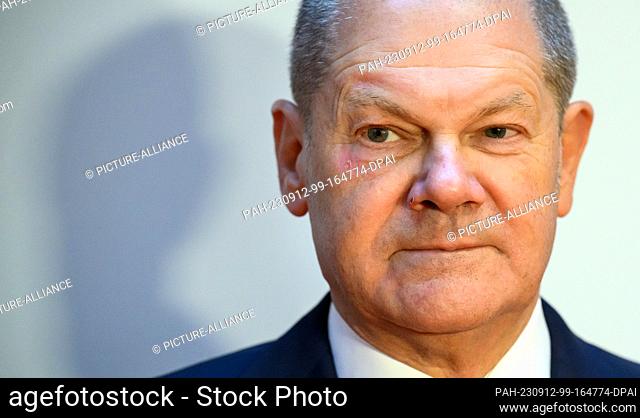 12 September 2023, Berlin: Chancellor Olaf Scholz (SPD) shows up at the International Meeting of the Christian Community of Sant'Egidio again without the eye...